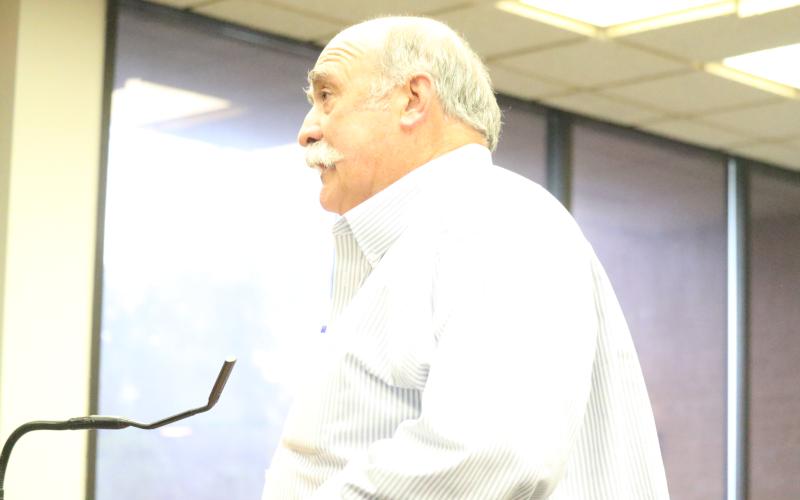 Live Oak Interim City Manager Larry Sessions answers questions from the City Council during a special meeting Friday. (JAMIE WACHTER/Lake City Reporter)