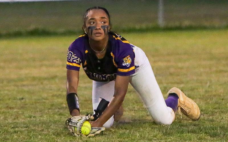 Columbia left fielder Sakiya Merriex looks up after making a diving catch against Williston on Thursday night. (BRENT KUYKENDALL/Lake City Reporter)