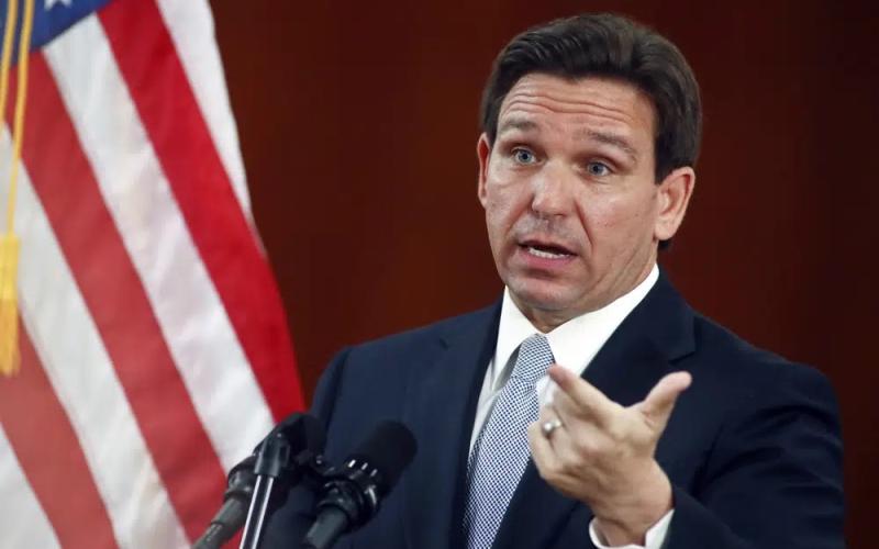 Florida Gov. Ron DeSantis answers questions from the media in the Florida Cabinet following his State of the State address during a joint session of the Senate and House of Representatives on March 7 at the state Capitol in Tallahassee. (AP FILE)