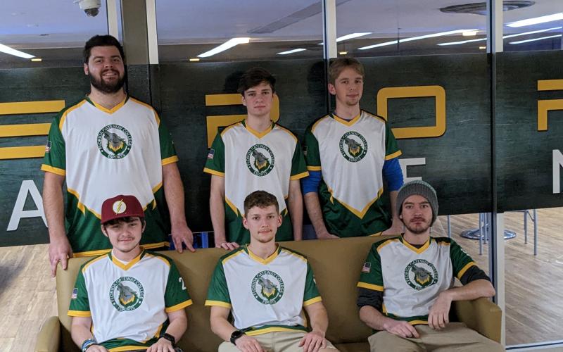 Florida Gateway College’s Esports team concluded the regular season undefeated and will compete at the national tournament this weekend. Front row: Hunter ‘Flash’ Neeley (from left), Colby Thompson and Dallas Hurst. Back row: Andrew Harper (from left), Jesse Campbell and Jared Campbell. Not pictured: James Hickmon. (COURTESY FGC)
