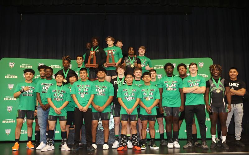 Suwannee’s weightlifting team poses with its two trophies after sweeping the District 5-1A titles on Friday. (PAUL BUCHANAN/Special to the Reporter)