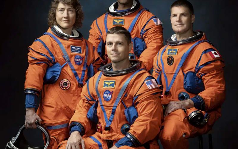 This photo provided by NASA shows, from left, NASA Astronauts Christina Koch, Victor Glover, Reid Wiseman, and Canadian Space Agency Astronaut Jeremy Hansen at the Johnson Space Center in Houston on March 29, 2023. (JOSH VALCARCEL/NASA via AP)
