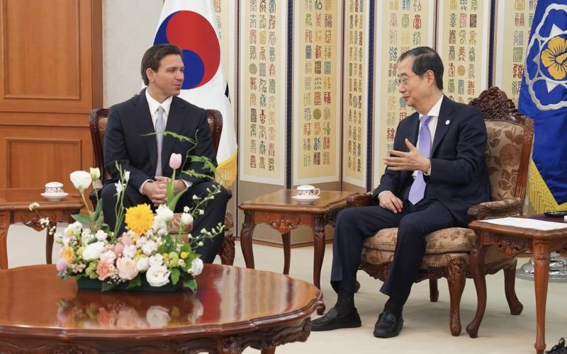 Florida Gov. Ron DeSantis talks with South Korean Prime Minister Han Duck-soo on Wednesday as part of a four-nation trade mission trip. (COURTESY Office of the Governor)