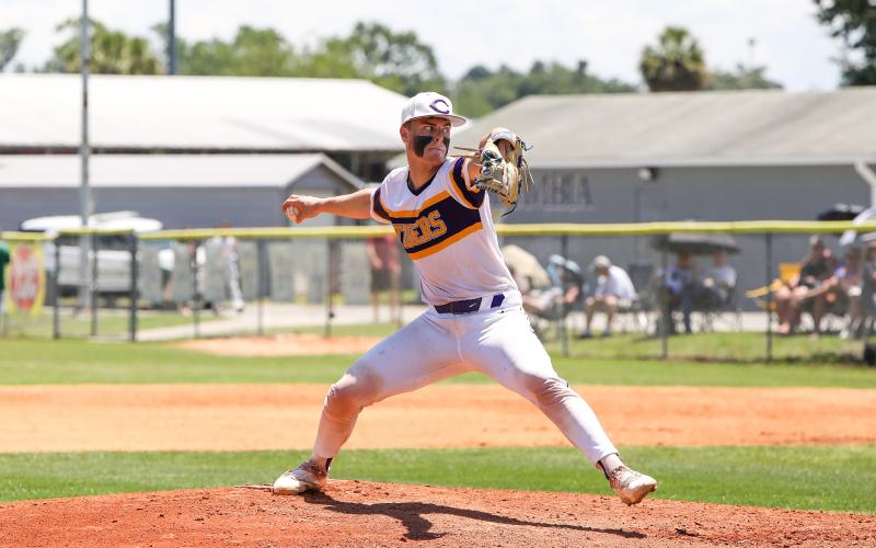 Columbia pitcher Hayden Gustavson pitches against Lincoln on Saturday in the Region 1-5A semifinals. (BRENT KUYKENDALL/Lake City Reporter)