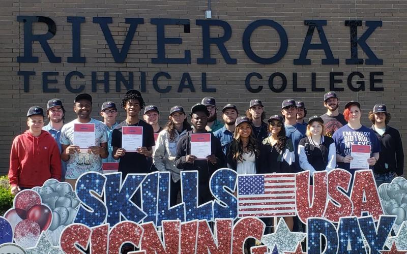 Twenty-three area students took part in the SkillsUSA National Signing Day on Thursday, pledging to continue their career and technical education at RIVEROAK Technical College. (COURTESY)