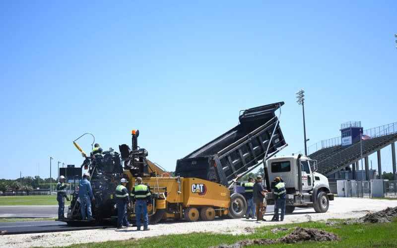 Crews from C.A. Boone Construction and Bubba’s Site Prep work on Columbia High’s track at Tiger Stadium. (COURTESY)