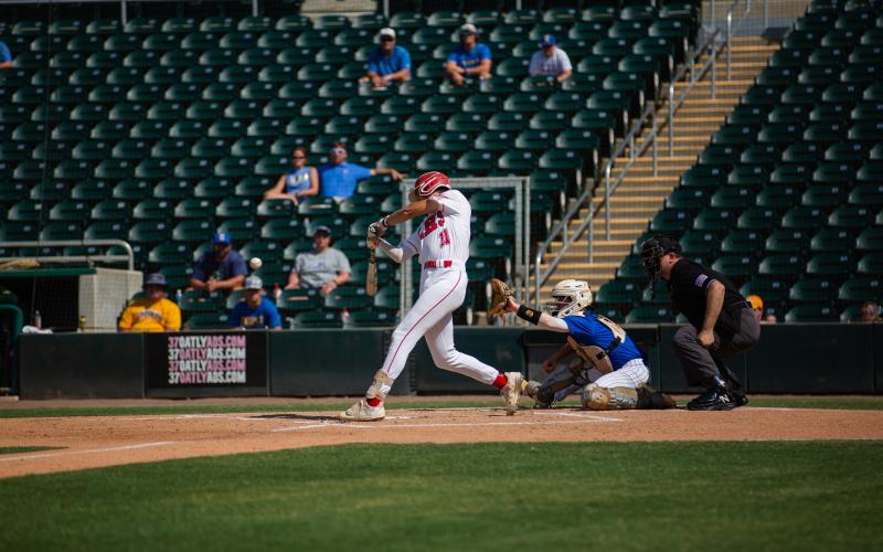 Lafayette first baseman Lane Brock swings at a pitch against Chipley in the Class 1A state championship Thursday at Hammond Stadium in Fort Myers. (JESSICA PINALD/Special to the Reporter)