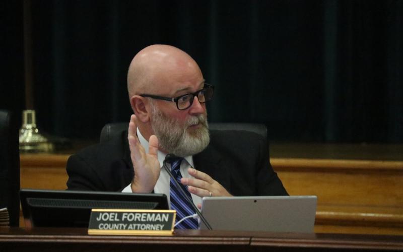 County Attorney Joel Foreman discusses Columbia County’s potential response to Florida PACE Funding Authority’s actions to provide residential PACE loans in the county without approval. (JAMIE WACHTER/Lake City Reporter)