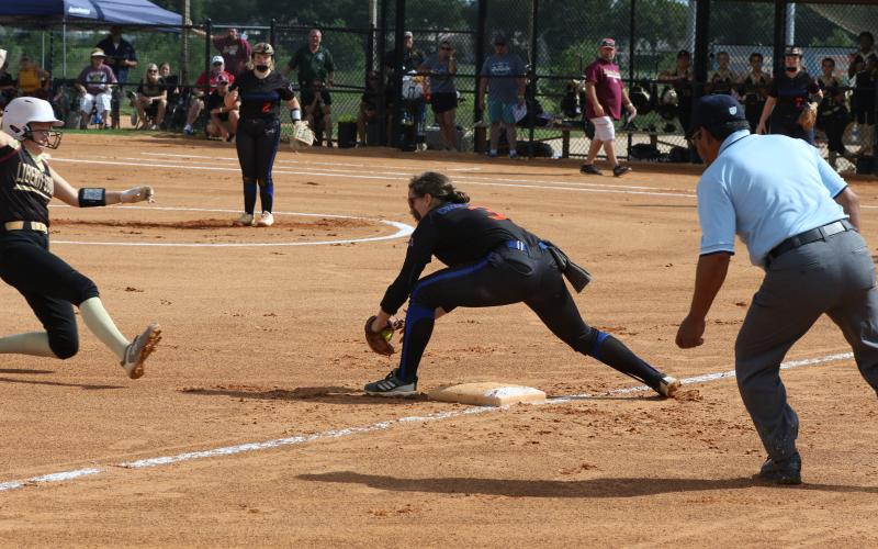 Branford shortstop Cloey Criggall is called for obstruction after tagging out Liberty County second baseman Gabriella Flowers during Wednesday’s Class 1A state championship game at Legends Way Ballfields in Clermont. (MORGAN MCMULLEN/Lake City Reporter)