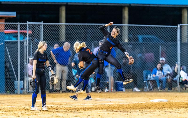 Branford pitcher Laila Arnold (left) celebrates with shortstop Cloey Criggall after the Buccaneers topped Aucilla Christian 2-0 to advance to the Class 1A Final Four. (JACK HOWDESHELL/Special to the Reporter)