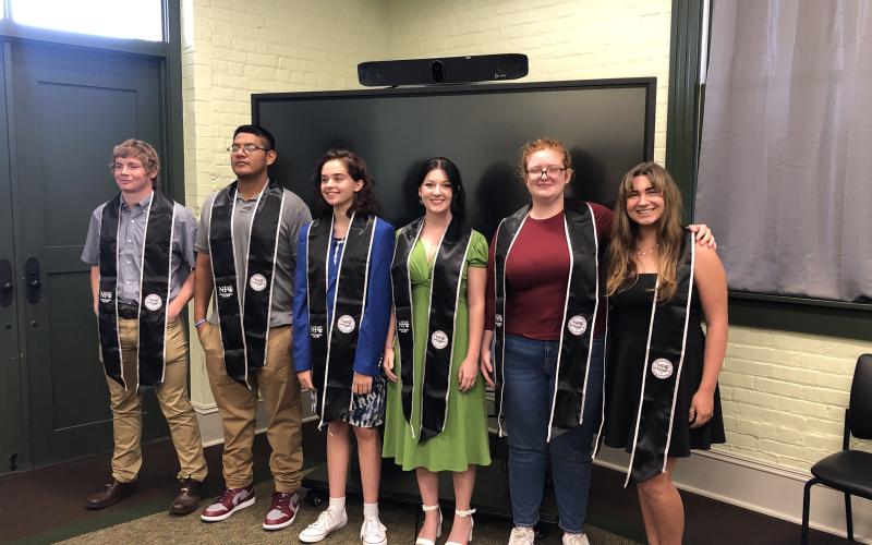 North Florida College Sentinel Scholars Collegiate Academy students are all smiles after receiving their custom stoles to wear during graduation. Pictured are Brice Criggall (from left), Juan Sandoval, Ariana Lane, Cayla Anastasio, Gracie Clements and Laura Watson. Not pictured is Emma Clary. (COURTESY)