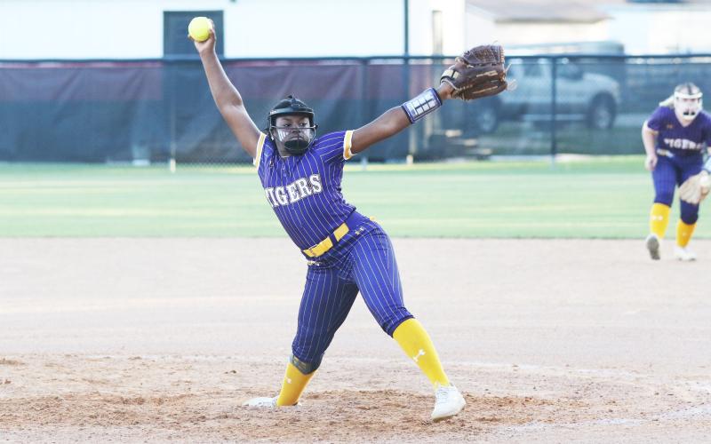 Columbia pitcher Zoryana Hughes winds up to pitch against Middleburg in the District 2-5A semifinals on Tuesday night. (MORGAN MCMULLEN/Lake City Reporter)