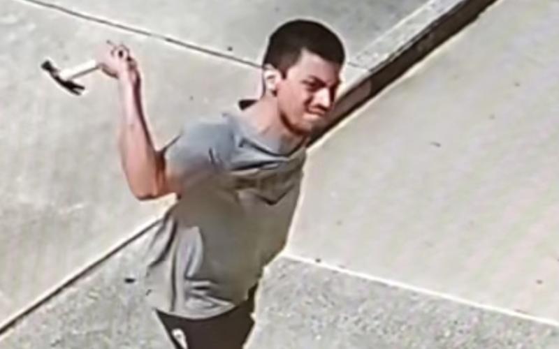 An unidentified man smashed out a side window at the Columbia Courthouse Annex on Friday by throwing a hammer through it. He also broke a window on a county employee’s car with the hammer. If you recognize this man, call the Lake City Police Department at 386-752-4343. (COURTESY)