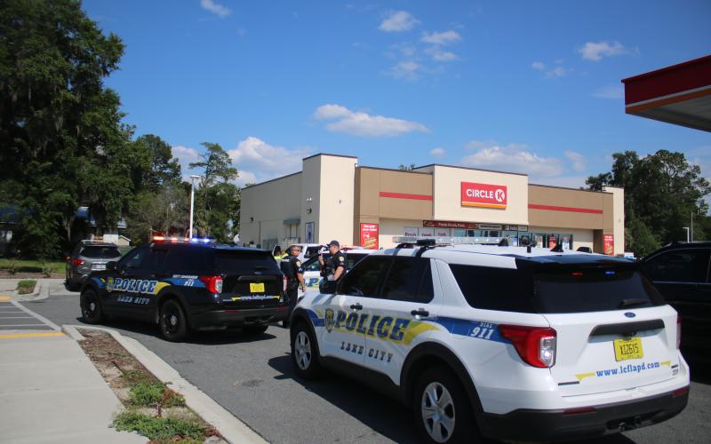 Lake City Police vehicles block off a road beside the Circle K gas station on Baya Avenue on Thursday. (TONY BRITT/Lake City Reporter)