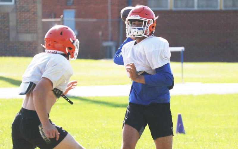 Branford quarterback Thomas Sikes throws a pass during Thursday’s practice. (JAMIE WACHTER/Lake City Reporter)