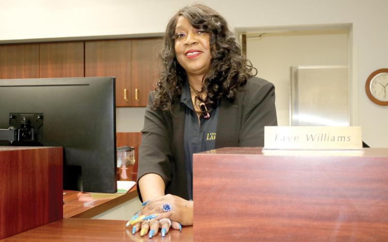 Faye Williams, a customer representative with the City of Lake City, is retiring after 44 years working with the city. (TONY BRITT/Lake City Reporter)