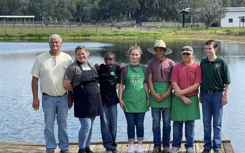 Lafayette County 4-H grillmasters that competed at the Regional Tailgate competition include County 4-H Agent Shawn Jackson (from left), Taylor Swinson, Jaxon Murphy, Alicia Swinson, Jayden Lumpkin, Justin Swinson Jr., and Holland Jackson. (COURTESY)