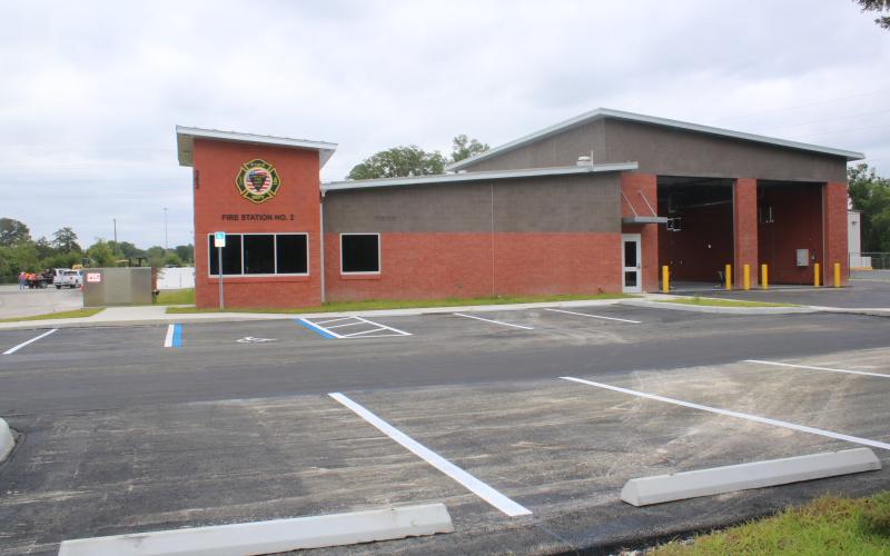 The parking lot at the Lake City Fire Station 2 was repaved last week after the original asphalt was ‘unraveling.’ The issue has delayed the station opening. (TONY BRITT/Lake City Reporter)