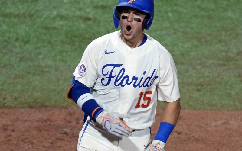 Florida's BT Riopelle celebrates his solo home run against South Carolina during the sixth inning of Friday's super regional opener in Gainesville. (JOHN RAOUX/Associated Press)