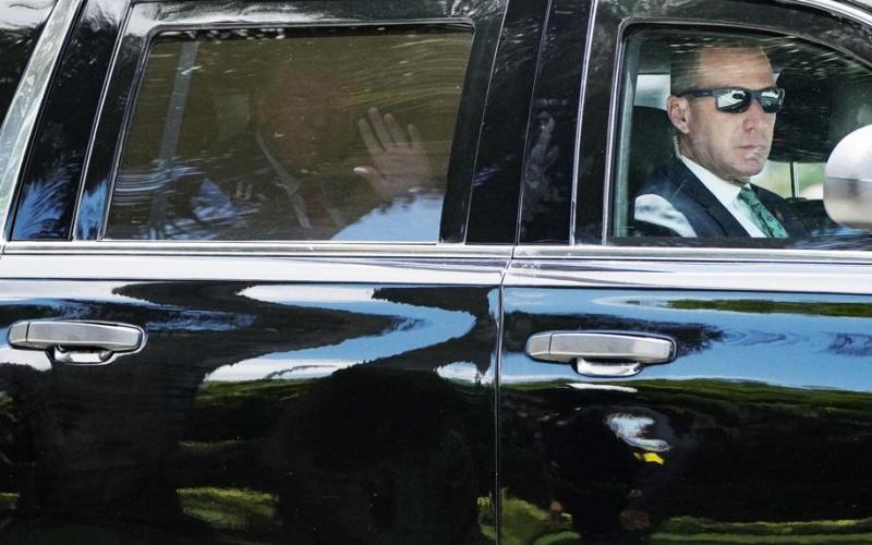 Former President Donald Trump leaves Trump National Doral resort on Tuesday in Doral on his way to Federal Court. (JIM RASSOL/Associated Press)