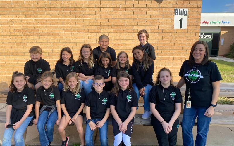 The Suwannee Springcrest Elementary School Student Lighthouse Team, which is composed of third-, fourth-, and fifth-grade students, with coordinator Theda Roper. Front Row: Kadence Rickett (from left), Alania Hodge, Addison Rodgers, Ryan Keeler, Willow Hamilton, Zoey Sturdivant and Roper; Middle Row: Kydin Leighton, Brielle Dukes, Ila Alcorn, Bailee Jo Ambrose, Olivia Cauley and Kahleigha Mobley; Back Row: Alberyo Casado and Jayce Olive.  Not pictured: Hanna Beard. (COURTESY)