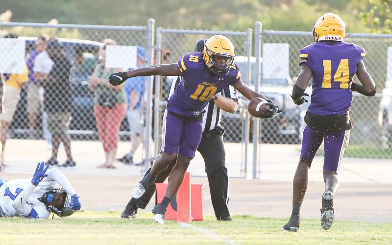 Columbia receiver Zamarion Jones (10) celebrates with receiver Jasper White (14) after scoring a touchdown against Bartram Trail during the teams’ spring game on May 19. (BRENT KUYKENDALL/Lake City Reporter)