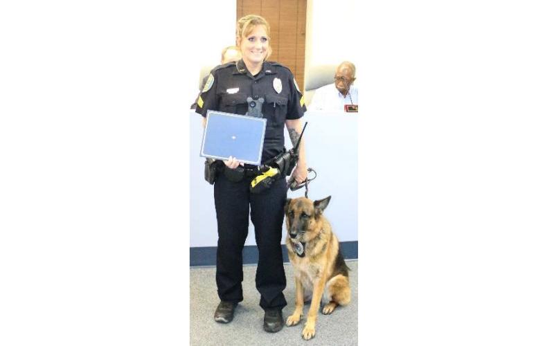 Inca and her handler, Sgt. Connie Milligan, are pictured at Inca’s retirement ceremony in 2019. (COURTESY)