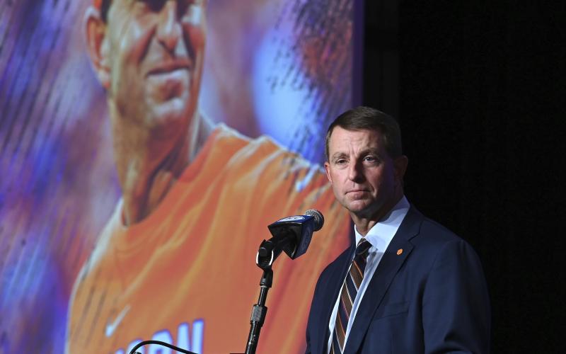 Clemson head football coach Dabo Swinney listens to a reporter's question during ACC Media Days on Thursday in Charlotte, N.C. (JEFF SINER/The Charlotte Observer via AP)