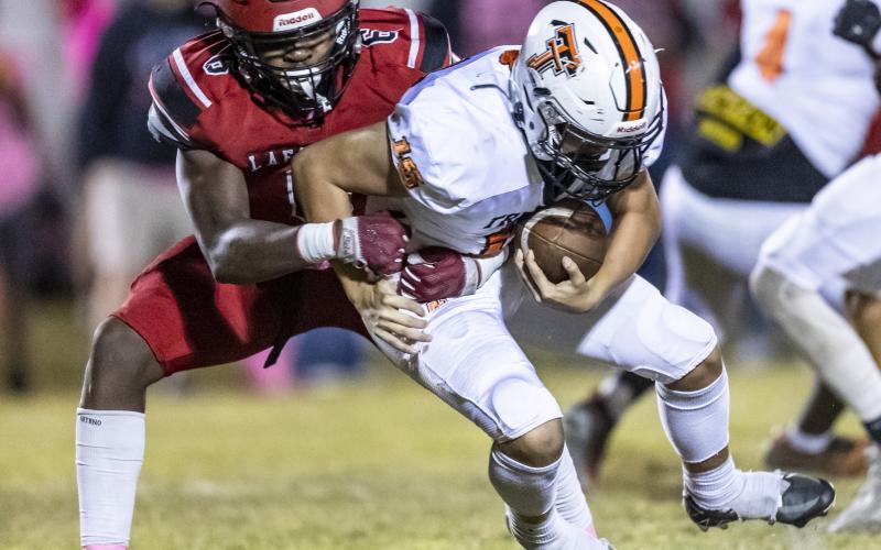Lafayette defensive end Amarie Fleming makes a tackle against Trenton last season. (FILE)