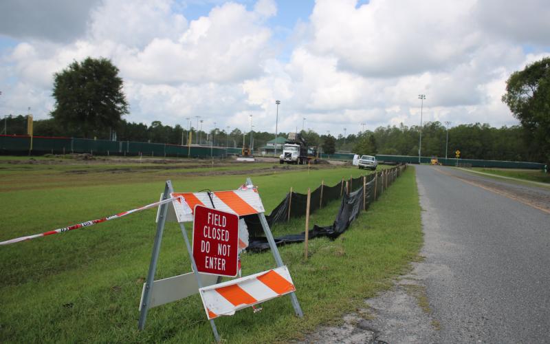 Crews work on a project at Southside Sports Complex to add 90 new parking spots as well as address drainage issues at the recreation complex. (TONY BRITT/Lake City Reporter)