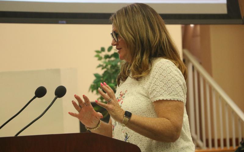 Richardson Community Center Board Treasurer Tammy Magstadt discusses programming at the center with the Columbia County Commission on Thursday. (MORGAN MCMULLEN/Lake City Reporter)