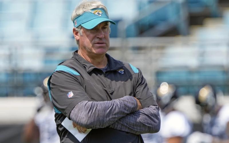Jacksonville Jaguars head coach Doug Pederson watches players run through drills during practice on June 5 in Jacksonville. (AP FILE)