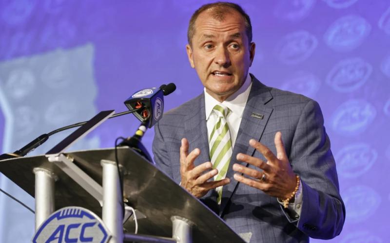 Atlantic Coast Conference Commissioner Jim Phillips answers a question at ACC Media Days on July 20, 2022, in Charlotte, N.C. (AP FILE)
