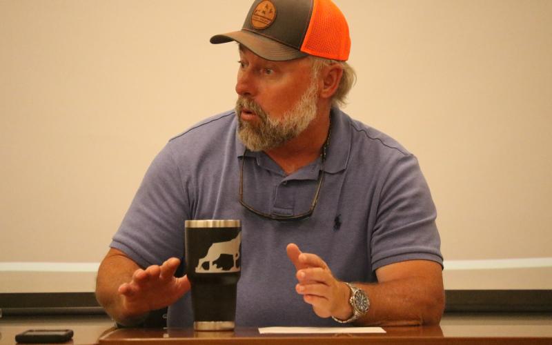 Columbia County Assistant County Manager Kevin Kirby discusses the need for an organized group dealing with regional utilities at a meeting Wednesday. (JAMIE WACHTER/Lake City Reporter)