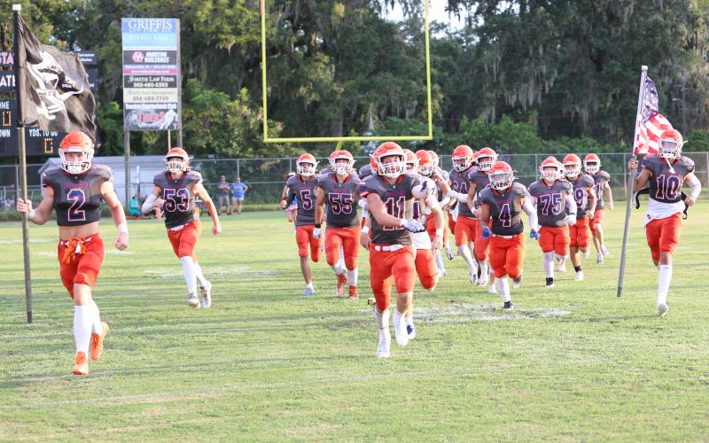 Branford takes the field prior to Friday’s Jamboree at Trenton. (PAUL BUCHANAN/Special to the Reporter)