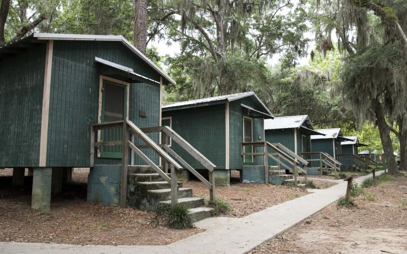 The historic cabins at Florida 4-H Camp Cherry Lake in 2019 before they were removed. Florida 4-H is aiming to raise $3.5 million to construct five new cabins at the camp in Madison County. (COURTESY)