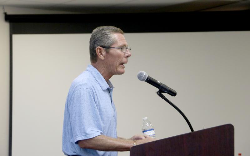 George Hudson, a resident along Lake Montgomery, addressed concerns about the project to place a new pier on the lake with the Lake City Council at Monday's meeting. (MORGAN MCMULLEN/Lake City Reporter)