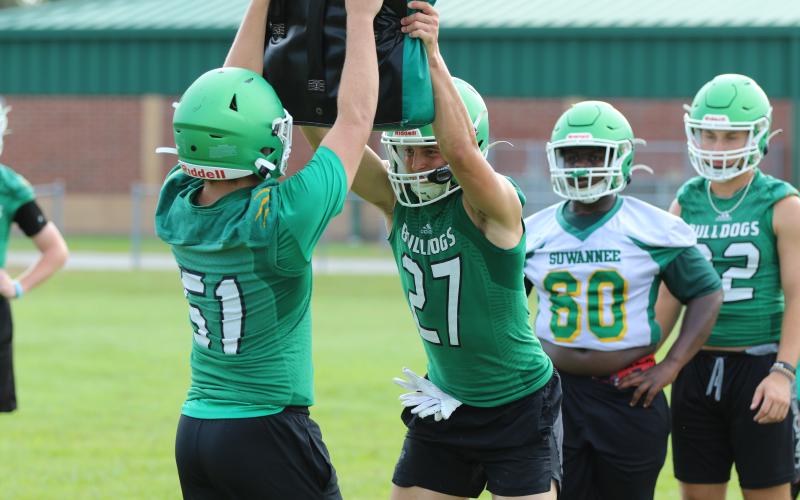 Suwannee defensive end Sam Wainwright performs a drill during Monday’s practice. (JAMIE WACHTER/Lake City Reporter)