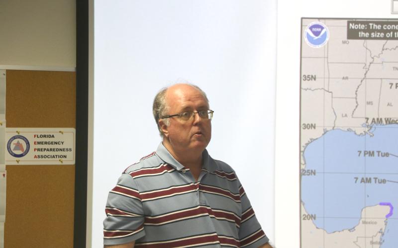 Columbia County Emergency Management Director Shayne Morgan gives a briefing during Monday afternoon's meeting. (MORGAN MCMULLEN/Lake City Reporter)