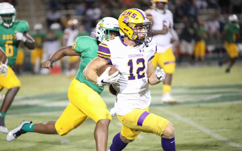 Columbia receiver Camdon Frier runs up the field after a catch against DeLand last Friday. (BRENT KUYKENDALL/Lake City Reporter)