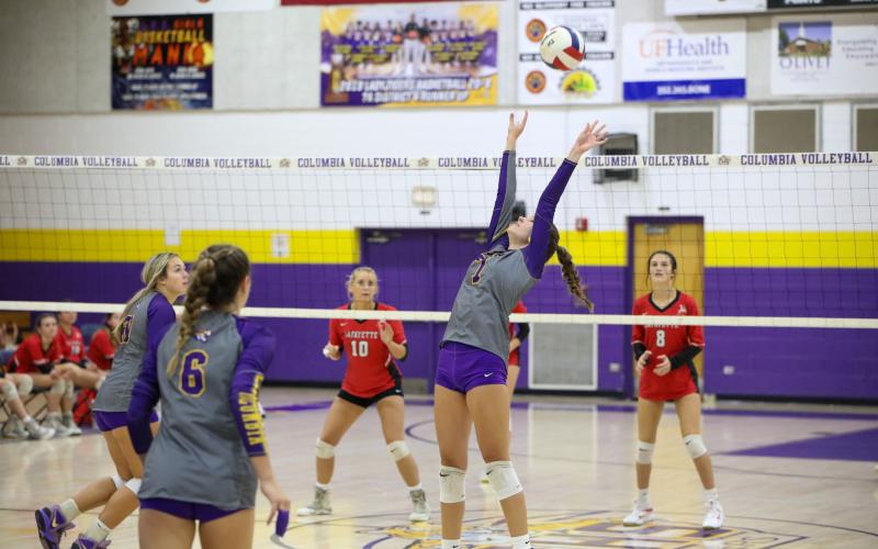 Columbia setter Mylie Fernandez (7) passes a shot to a teammate against Lafayette on Tuesday night. (BRENT KUYKENDALL/Lake City Reporter)