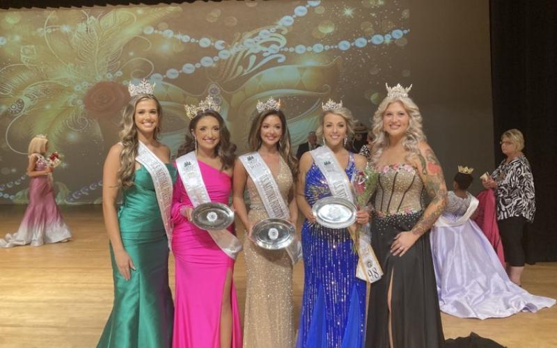 Three locals won titles at the U.S. National Forestry Pageant on Saturday in Tifton, Ga. Pictured are Manda Perry (Miss U.S. National Forestry 2022), from left, Mikah McCoy (Miss U.S. National Turpentine 2023), Lindsey Langston (Miss U.S. National Forestry 2023), Ashley Douylliez (Ms. U.S. National Forestry 2023), and Maddie Kelley (Ms. U.S. National Turpentine 2022). (COURTESY)