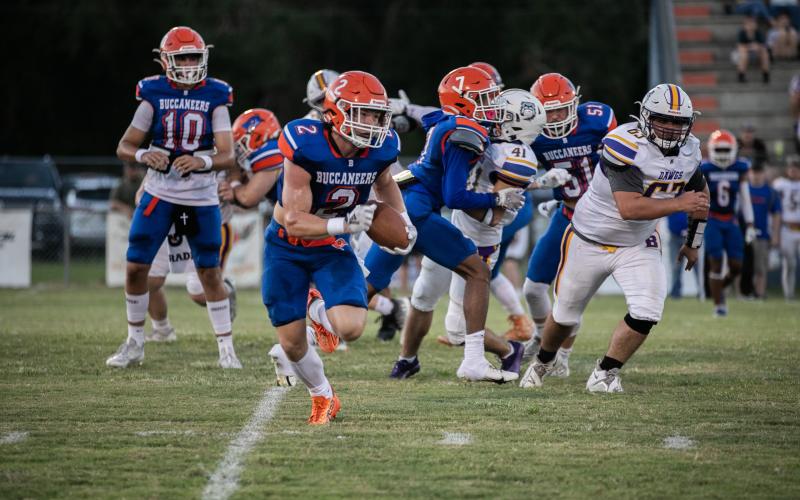 Branford running back Trevor Maddox takes a carry up the field against Bell on Saturday. (ERIN ROBERTS/Special to the Reporter)