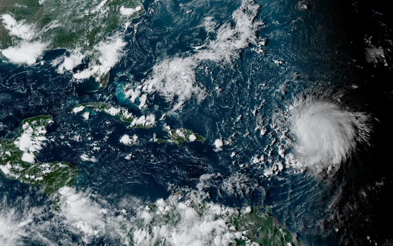 This satellite image provided by the National Oceanographic and Atmospheric Administration shows Hurricane Lee in the Atlantic Ocean on Friday. (NOAA)