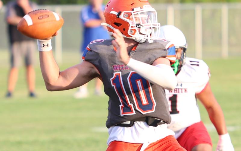 Branford quarterback Thomas Sikes drops back to pass against Fort White during the teams’ Preseason Jamboree on Aug. 18. (PAUL BUCHANAN/Special to the Reporter)