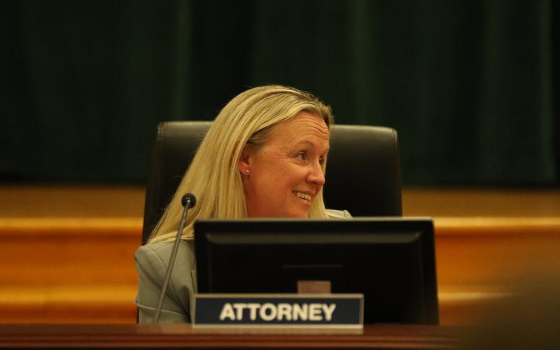Columbia School District Attorney Megan Logan speaks during Tuesday’s meeting. (JAMIE WACHTER/Lake City Reporter)
