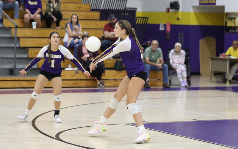 Columbia hitter Sinei Wood sets up a shot for a teammate against Oak Hall on Tuesday. (BRENT KUYKENDALL/Lake City Reporter)