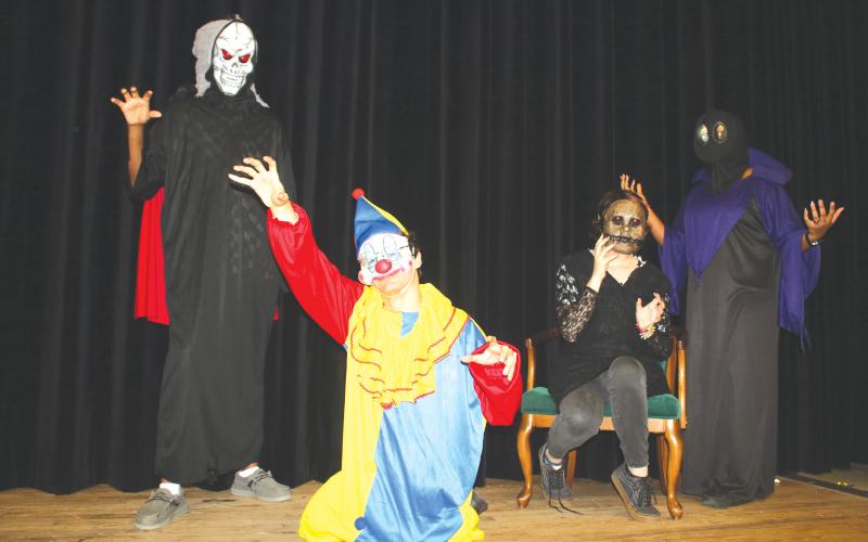 The Creepy Crew featuring Michael Davis as the Oogey ‘Boogey Man,’ Jeremias Sandoval as the ‘Creepy Clown,’ Annika Hunt as ‘Creepy Doll Face’ and Keptia Josma as ‘The Alien,’ will serve up frights and scares at the Columbia High School theatre’s program presentation of Scary Stories on Friday and Saturday night. (TONY BRITT/Lake City Reporter)