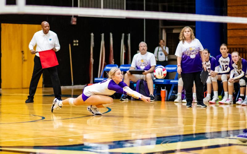 Columbia’s Avery Sandlin dives to return a shot against Ridgeview during Wednesday’s Region 1-5A quarterfinal. (JACK HOWDESHELL/Special to the Reporter)