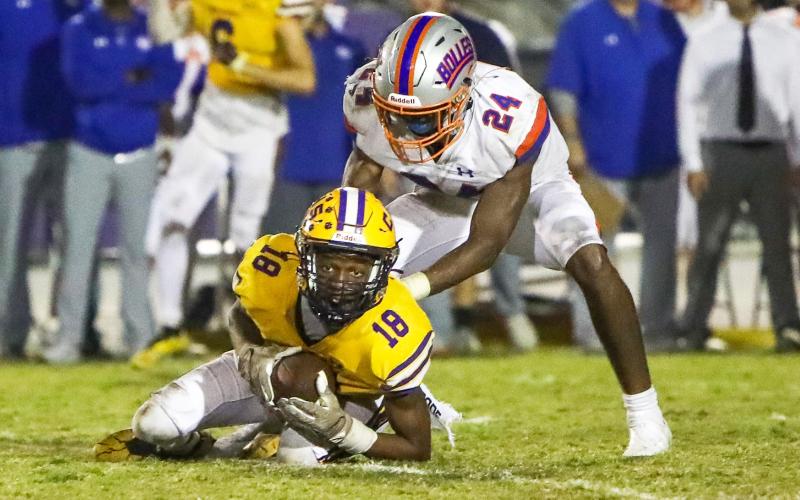 Columbia receiver Marlin Haywood makes a diving catch on fourth down to keep the game-winning drive alive against Bolles last Friday. (BRENT KUYKENDALL/Lake City Reporter)